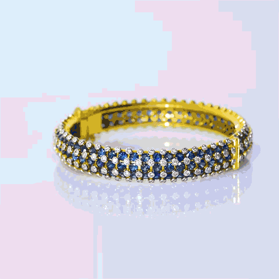 Adorn your wrist with the timeless elegance of our blue sapphire and diamond bangle - (GDB0238)