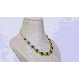 The necklace showcases a series of vibrant octagon-shaped emeralds - (PGDNE0128)