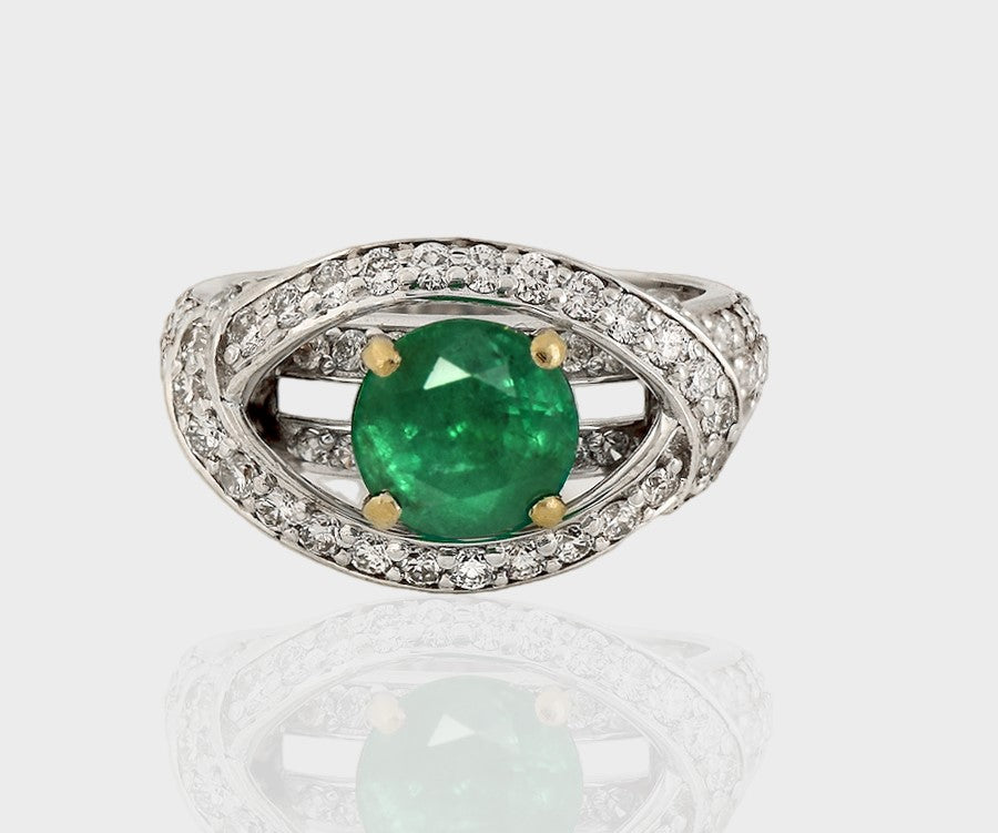 Ring featuring a captivating combination of an emerald-cut round gemstone and dazzling diamond rounds, designed to elevate your style with timeless elegance.(GDR0344)