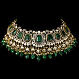 Stunning fusion-style necklace and earring pair featuring a majestic emerald octagon centerpiece, dazzling diamond polki, round diamonds, and elegant stringing of emerald maniya and pearls - KMNE3502