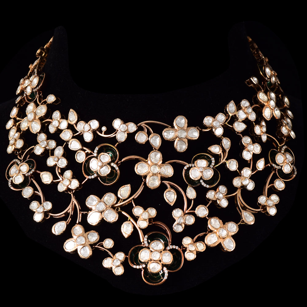 Exquisite fusion-style floral designer necklace, featuring dazzling diamond Polki and diamond rounds with intricate black Meena detailing at the center. - WDN1184