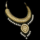 Graceful Ekposta necklace and earring pair adorned with radiant diamond polki, delicate pearl stringing, and vibrant emerald beads - KMNE3496