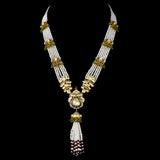 A mesmerizing fusion-style necklace and jhoomki pair adorned with diamond polki, round diamond stringing, lustrous pearls, and vibrant emerald and ruby beads - KMNE3486