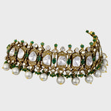 Exquisite flexible big Polki choker and earring set in fusion style, adorned with dazzling diamond rounds and emeralds. Elegantly strung with South Sea pearls and emerald beads - KMNE3565