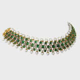 Exquisite choker necklace adorned with dazzling diamonds, vibrant emeralds, and lustrous pearls. - PGDNE0141