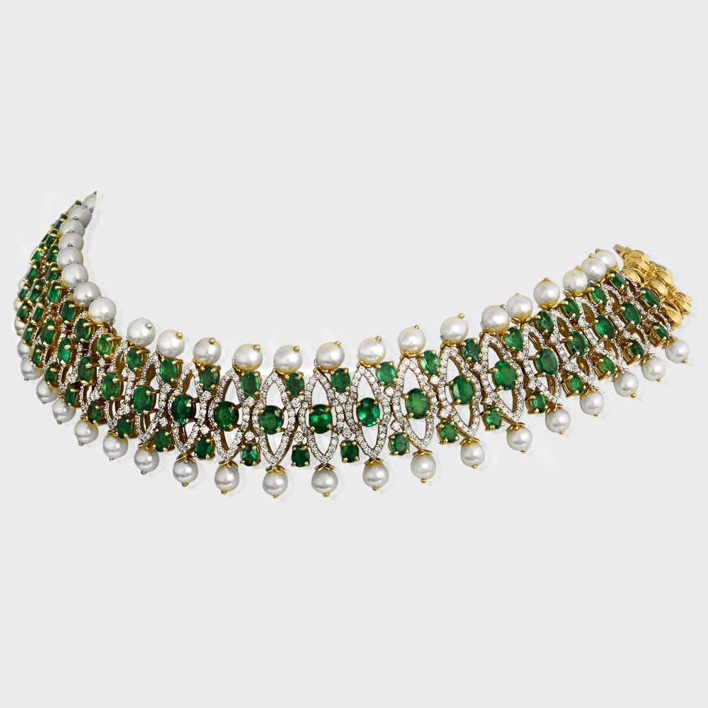 Exquisite choker necklace adorned with dazzling diamonds, vibrant emeralds, and lustrous pearls. - PGDNE0141