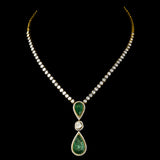 Elegant single-line necklace featuring dazzling diamond Polki, sparkling diamond rounds, and a stunning cut emerald pear - KMNE3538
