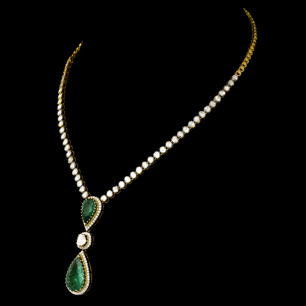 Elegant single-line necklace featuring dazzling diamond Polki, sparkling diamond rounds, and a stunning cut emerald pear - KMNE3538