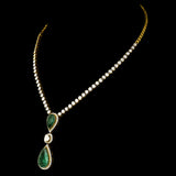 Elegant single-line necklace featuring dazzling diamond Polki, sparkling diamond rounds, and a stunning cut emerald pear - KMNE3538