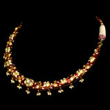 Exquisite traditional red Meena Hasli necklace and earring set, adorned with dazzling diamond Polki and elegant pearl accents.  - KMNE3552