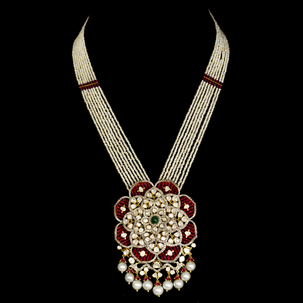 Exquisite fusion-style pendant and earring set, featuring dazzling diamond Polki, rose-cut diamonds, and emerald cabochons, elegantly strung with pearls and ruby beads. - KMPE1307