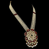 Exquisite fusion-style pendant and earring set, featuring dazzling diamond Polki, rose-cut diamonds, and emerald cabochons, elegantly strung with pearls and ruby beads. - KMPE1307