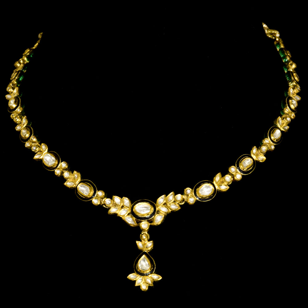 Sleek single-line necklace and earring set, featuring exquisite black enamel work and dazzling diamond Polki. - KMNE3574