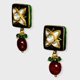 Elegant black Meena pendant and tops set, adorned with dazzling diamond Polki and gracefully strung with emerald and ruby beads. - KMPE1319