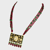 Elegant black Meena pendant and tops set, adorned with dazzling diamond Polki and gracefully strung with emerald and ruby beads. - KMPE1319