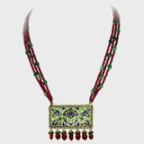 Elegant black Meena pendant and tops set, adorned with dazzling diamond Polki and gracefully strung with emerald and ruby beads. - KMPE1319