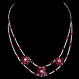 Elegant ruby and diamond necklace and earring set, featuring dazzling diamond rounds and rose-cut diamonds. - PGDNE0137