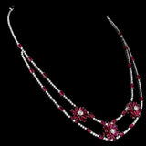 Elegant ruby and diamond necklace and earring set, featuring dazzling diamond rounds and rose-cut diamonds. - PGDNE0137