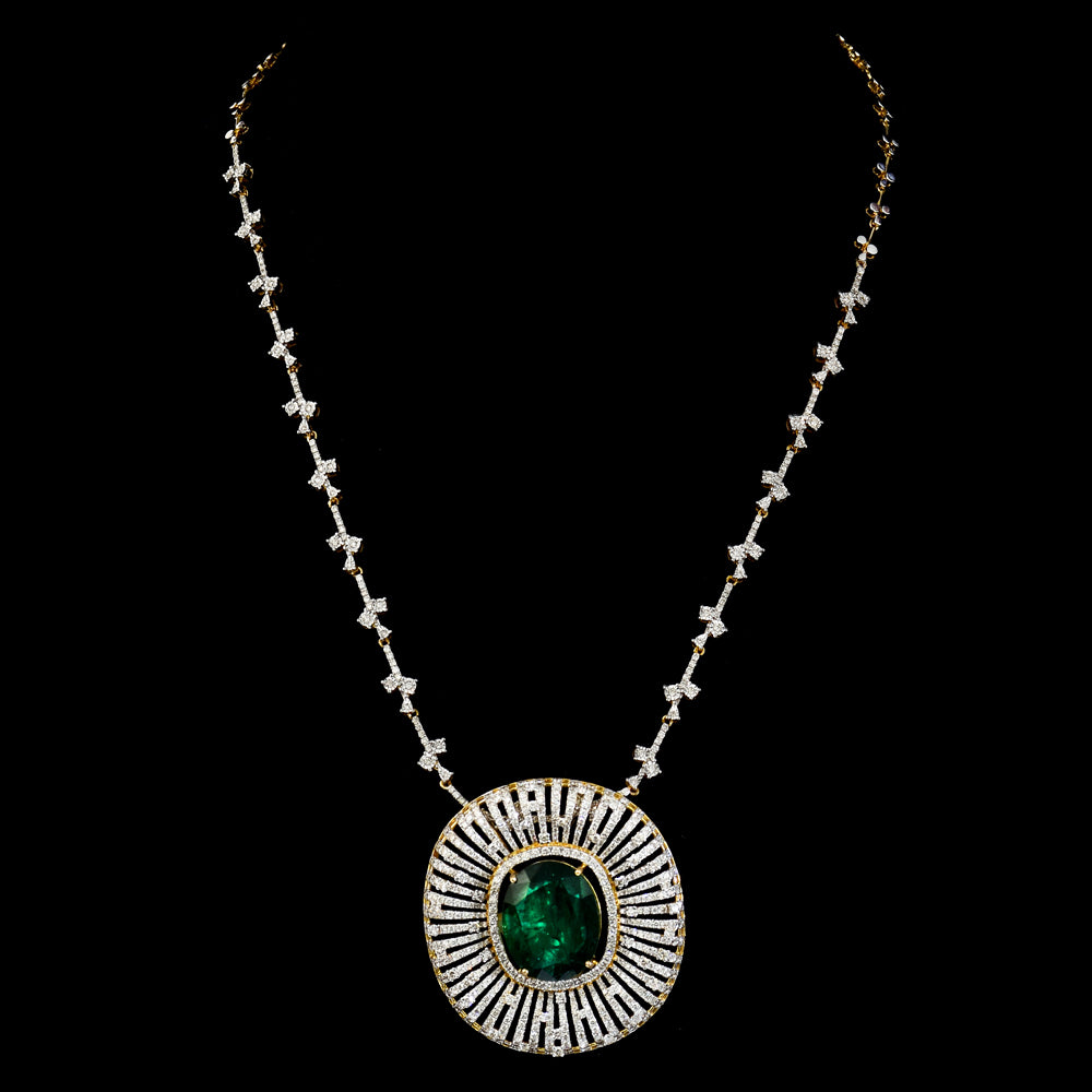 Stunning pendant featuring a bold oval-cut emerald, elegantly set with dazzling diamonds on a gold and diamond chain. - PGDPE0117