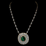 Stunning pendant featuring a bold oval-cut emerald, elegantly set with dazzling diamonds on a gold and diamond chain. - PGDPE0117