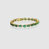 Radiate timeless elegance with this exquisite emerald and diamond bangle, where vibrant green gemstones and dazzling diamonds create a refined statement of luxury and grace.(GDBR0068)