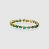 Radiate timeless elegance with this exquisite emerald and diamond bangle, where vibrant green gemstones and dazzling diamonds create a refined statement of luxury and grace.(GDBR0068)