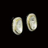 Halo Diamond Polki Tops Oversized Diamond Polki centres embraced by shimmering round diamonds, creating bold statement tops with refined brilliance and contemporary sophistication.(GDE0479)