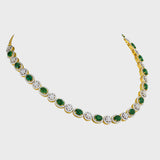 Enchant with elegance in our Emerald oval and diamond necklace and earring pair. Each piece exudes timeless sophistication and luxury.(GDNE0470)