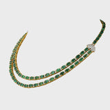 Our double line necklace set features mesmerizing Emerald ovals and dazzling round diamonds, perfectly curated to captivate hearts.(GDNE0488)