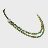 Our double line necklace set features mesmerizing Emerald ovals and dazzling round diamonds, perfectly curated to captivate hearts.(GDNE0488)