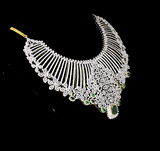 Exude timeless elegance with this stunning diamond and emerald necklace and earring set. A bold designer masterpiece, perfect for grand occasions.(GDNE0510)