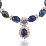 Elegant blue sapphire necklace adorned with brilliant round diamonds, blending timeless sophistication and everyday luxury in a graceful, refined design.(GDNE0513)