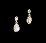 Elegant earrings featuring big-size Polki, sparkling round diamonds, and beautifully cut mutual diamonds. A stunning blend of traditional charm and modern sparkle—perfect for adding glamour to any special occasion.(GDNE0525)