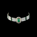 Exquisite choker necklace and tops pair for featuring a majestic central emerald, surrounded by dazzling diamonds. Adorned with rows of lustrous pearls and emerald beads, it blends traditional elegance with royal charm.(GDNE0526)