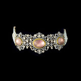 A beautifully structured choker featuring blush rose quartz centers, framed with polki and round diamonds, paired with matching statement earrings. (GDNE0542)
