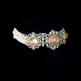 A beautifully structured choker featuring blush rose quartz centers, framed with polki and round diamonds, paired with matching statement earrings. (GDNE0542)