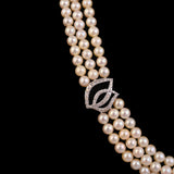 A classic three-string pearl necklace adorned with dazzling round diamonds, designed for graceful elegance and everlasting beauty.(GDNE0545)