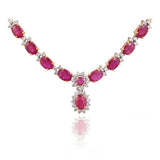 Delicate oval rubies framed with brilliant diamonds create a classic necklace that celebrates elegance in every detail.(GDNE0547)