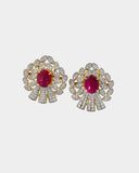 An exquisite pendant and earring set featuring red oval ruby cabochons accented with brilliant diamonds. Offering timeless elegance, rich colour, and refined luxury for a striking statement. (GDPE0403)