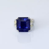 A mesmerizing deep blue sapphire ring adorned with sparkling diamonds, crafted to reflect timeless elegance, luxury, and sophistication for every special occasion.(GDR0350)