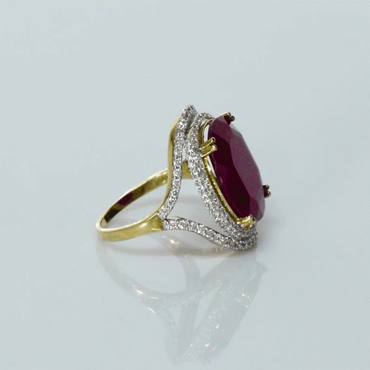 Timeless elegance meets bold beauty — a natural ruby centerpiece embraced by sparkling diamonds, set in radiant gold. (GDR0356)