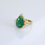 Pear-cut emerald ring with sparkling diamonds, designed for timeless elegance, luxury, and everyday sophistication.(KCA-8)
