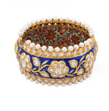 Blue meena broad kada in 22k gold with uncut diamond The broad size of the kada ensures that it fits comfortably on most wrist sizes and the sturdy construction makes it a durable piece of jewelry that can be treasured for years to come.  - KMB0485