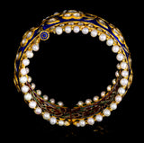 Blue meena broad kada in 22k gold with uncut diamond The broad size of the kada ensures that it fits comfortably on most wrist sizes and the sturdy construction makes it a durable piece of jewelry that can be treasured for years to come.  - KMB0485