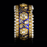 Blue meena broad kada in 22k gold with uncut diamond The broad size of the kada ensures that it fits comfortably on most wrist sizes and the sturdy construction makes it a durable piece of jewelry that can be treasured for years to come.  - KMB0485
