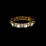 Elegant antique gold bangle featuring large square polki diamonds accented with fine detailing. A timeless piece that reflects royal heritage and impeccable craftsmanship for special occasions.(KMB0586)