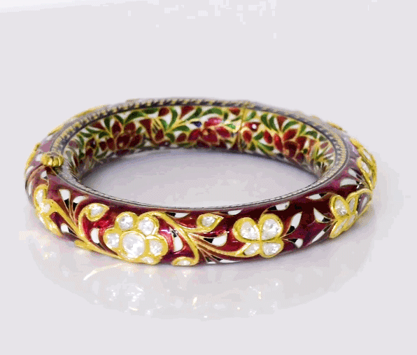 Elegant antique gold bangle featuring large square polki diamonds accented with fine detailing. A timeless piece that reflects royal heritage and impeccable craftsmanship for special occasions.(KMB0587)