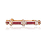 Delicate yet striking, this ruby and diamond bangle adds a touch of brilliance to every occasion.(KMB0628)
