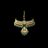 Royal Kundan mathapatti adorned with teardrop polki diamonds and emerald bead drops. A majestic bridal accessory blending traditional grandeur with timeless elegance for a regal look.(KMBOR0113)