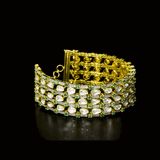 Versatile gold choker cum bracelet adorned with shimmering round diamonds, uncut diamond polki, and vibrant oval emerald accents, crafted in layered elegance to create a bold, luxurious statement for contemporary and traditional looks. (KMBR0150)